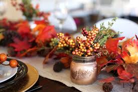 This outdoor fall tablescape celebrates autumn and harvest season with its seasonal colors and beautiful blooms set on a rustic table. The Prettiest Autumn Tablescape Everyday Reading