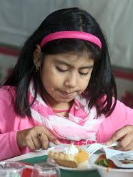 Sharing Community serves Christmas dinner for the needy in Yonkers