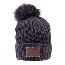 This Pom Beanie Is Knit Out Of 100 Cotton Yarn In A Black Color It Features A Brown Leather Patch Love Your Melon Love Your Melon Hats Love Your Melon Beanie