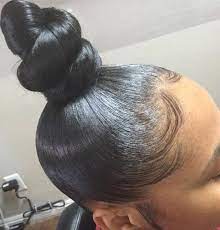 This is one of those hairstyles that is great for both day and night events. Top Knot Bun Haare Afroamerikanische Frisuren Geflochtene Haare
