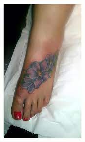 Violet Flower Foot Tattoo By Malitia Tattoo89 On Deviantart Violet Flower Tattoo Violet Tattoo Flower Foot Tattoo