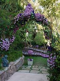 Planning A Wedding Then Consider A Twig Arbor Decorated With Your Favorite Color Of Flowers Violet Garden Garden Arches Garden Archway