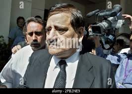 Pakistans Attorney General Malik Mohammed Qayyum, leaves Supreme Court  after a hearing, Tuesday, Sept. 25, 2007, in Islamabad, Pakistan. President  Gen. Pervez Musharraf will stay