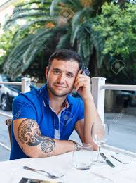 At blue tattoo cafe we prefer to do all custom tattoo work. Portrait Of A Man With Tattoo On His Hand Dressed In Blue T Shirt Stock Photo Picture And Royalty Free Image Image 39355163