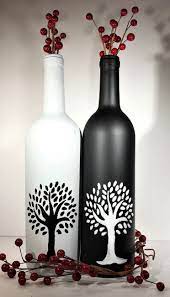 Black And White Trees Hand Painted On Wine Bottles Reflect The Beauty And Simplicity Of Nature Hand Painted Wine Bottles Glass Bottles Art Bottle Art