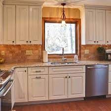 One of my most frequently asked questions deals with paint colors that coordinate well with wood trim and cabinets. 40 Best Wood Trim And White Cabinets Ideas Kitchen Remodel Wood Trim Kitchen Design