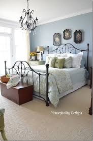 Can you hear a harpsichord providing some romantic background this wrought iron canopy bed is shown with an exquisite wrought iron chandelier. Metal Bed Bedroom Ideas Design Corral