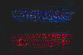 No bundles, no malware, focus on quality. Blue And Red Light From Computer Free Stock Photo