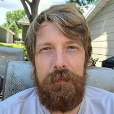 Hair update: Still have not trimmed a single strand. Last night a female  friend said that I look like if you morphed Alf with the dad