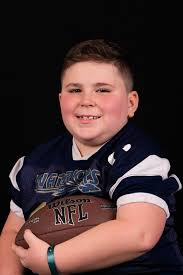 This afternoon's Chesnee High School Football practice took a little pause  to celebrate a big achievement! Clary Phillips with Broad River Electric  Cooperative stopped by to present Kjay Proctor with a trophy