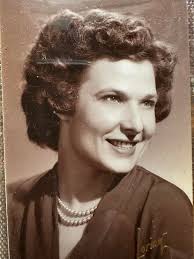 Who is the woman in the photo descending from Oscar and Lula Alley?