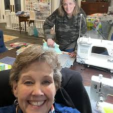 Happy Saint Patrick's Day from us and green Norm!!! We did it!... we  finished our Norm and Nanette quilt!! It is so adorable! And I can't  believe we finished it! The pattern