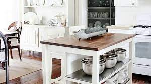 Combining a sleek, white, contemporary island with the earthy elements of the natural wood moulding and cabinets bring a cozy warmth and depth to this eclectic farmhouse kitchen. 50 Inspirations Vintage Farmhouse Style Kitchen Island Youtube