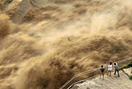 Water is released from the three gorges dam on the yangtze river, in yichang, central china's hubei province, june 29, 2020. China S Worsening Floods Highlight Extreme Weather Threat Bloomberg