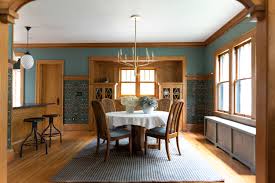 The addition of wall sconces creates a layered lighting effect in bedrooms. Modern Craftsman Kitchen And Dining Room Remodel Hello Norden