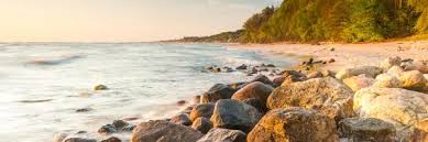 The sea is mostly obstructed by the trees. The Best Available Hotels Places To Stay Near Rozewie Poland