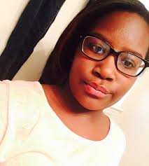 Nicole Paige brooks takes a family photo with Kori, Lydia and her friend  Ava Grace