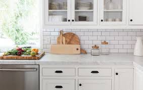 The beautiful backsplash has a mixture of brown tones that add dimension and texture to the focal wall. 16 Subway Tile Ideas