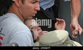 Nadia Bloom, 11, missing since Friday afternoon, is carried by rescuers  after being found