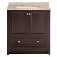 This bathroom vanity cabinet is a stylish modern solution. Glacier Bay Delridge 31 In W X 19 In D Bathroom Vanity In Chocolate With Solid Surface Vanity Top In Caramel Mvc30p2 Ch The Home Depot Solid Surface Vanity Top Marble Vanity