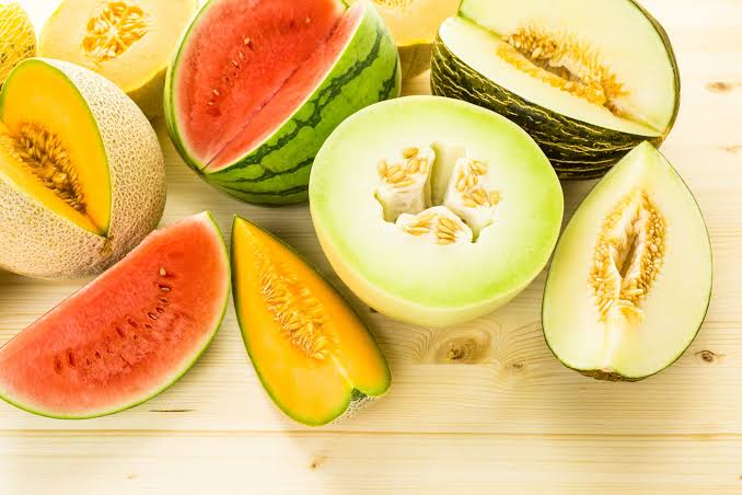 The vibrant spectrum of summer melons., AI generated