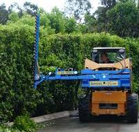 Easily convert your skid steer loader into a hedge trimmer ...