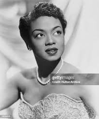 Hazel Scott, pianist and singer, with husband Adam Clayton Powell,... News  Photo