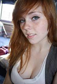 Redhead; freckles and cleavage Porn Pic 