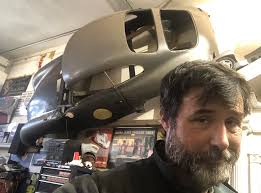 Porsche 356 with modern car under tiny body