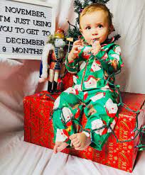 Take a picture of baby with christmas lights or a christmas tree nearby. 45 Baby Christmas Picture Ideas Capture Holiday Joy 2021 Guide