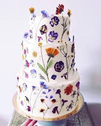 Placing fresh flowers into a cake without sealing them can cause toxic chemicals (like pesticides) to leach into the cake and potentially cause a major food hazard to your guests. 100 Most Beautiful Wedding Cakes For Your Wedding Beautiful Wedding Cakes Summer Wedding Cakes White Wedding Cake