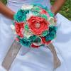 Wedding bouquets that have red pink purple teal and coral. 3