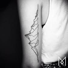 Bite The Bullet Tattoo Kelso Linear Tattoos By Mo Ganji Mo Ganji Line Tattoos Tricep Tattoos