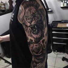 Top 63 Lion Sleeve Tattoo Ideas 2020 Inspiration Guide Lion Head Tattoos Cool Tattoos For Guys Lion Tattoo Sleeves