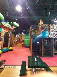 Safari Nation Is A Large Indoor Playground With Inflatables Jungle Gyms A Zip Line Party Places For Kids Toddler Bounce House Kids Birthday Party Places