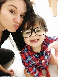 Army soldier, 33, is charged with murdering his pregnant wife and injuring  his unborn child