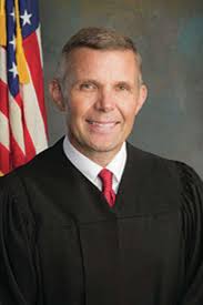 Justice announces appellate court candidacy