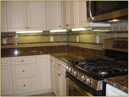 Baltic Brown Granite Countertops With White Cabinets Galley Kitchen Remodel Brown Granite Countertops Kitchen Remodel