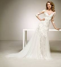 Robe trapèze ample réalisée dans une suédine (touché peau de pèche façon daim) dans les tons marron kaki avec une broderie ajourée dans le bas des manches et de la robe. Ou Acheter Sa Robe De Mariage Forme Trapeze Dalina Createur Pronovias Sur Marseille Sonia B