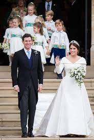 It was inspired by dresses worn by former royal brides. 12 Hidden Details You Missed On Princess Eugenie S Wedding Dress