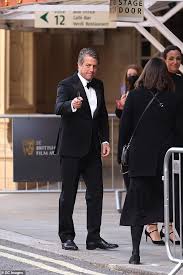 Grant, 54, or his screen rival. Bafta 2021 Film Awards Hugh Grant And Wife Anna Eberstein Hit Red Carpet In London Daily Mail Online