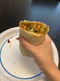 Wild sustainable alaska pollock in crispy panko breading served with homemade red and white cabbage slaw, cilantro and topped with chipotle mayo or ranch dressing (3 tacos). Big Ol Fish Taco Style Burrito For Right Around 200 Calories Sorry I Ate A Good Amount Before I Thought To Share Lol Volumeeating