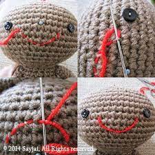 This is the technique i use to add faces to my crocheted squirrels. How To Embroider Mouth Crochet Dolls Crochet Crochet Projects
