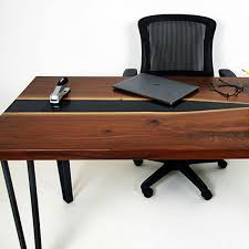 The table stands are made from beech tree wood. Live Edge Black Walnut Coffee River Desk Black Epoxy Resin