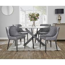 Add extra seating with a contemporary flair by choosing a bench for your dining room. Unique Cairns Round Table 4 Chairs