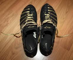 He wore gold shoes when he ran the 200m and the 400m. Michael Johnson Nike Zoom Jsc Track Shoes Black Gold 14 Jpegbay Com