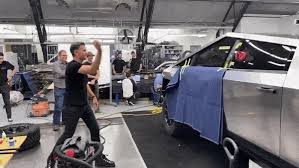 Apparently these guys didn't rehearse this. Ball Busters Elon Musk Proves Tesla Cybertruck S Unbreakable Windows Really Work Carscoops