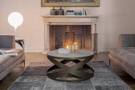 Glass tabletop gives the illusion of space for an open airy feel making this table perfect for smaller homes. Coffee Table With Metal Frame Marble Base And Glass Top Idfdesign