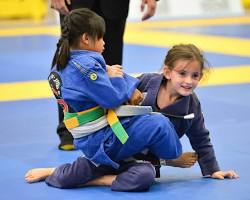 Image of kids practicing JiuJitsu