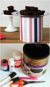 You could do this with plastic or metal cans, just make sure that you use enough paint to cover the color if you're using plastic. 30 Crafty Repurposing Ideas For Empty Coffee Containers Diy Crafts